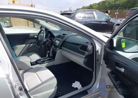 2014 Toyota Camry Le z USA, uszkodzony, nr VIN 4T4BF1FK7ER382583